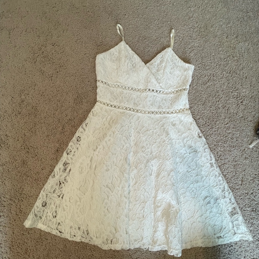 Francesca’s white lace dress
